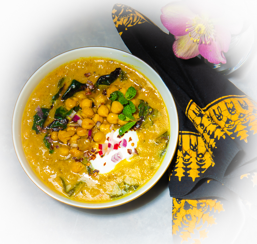 A Signature Dish Spiced Chickpea Stew With Coconut and Turmeric Blue 