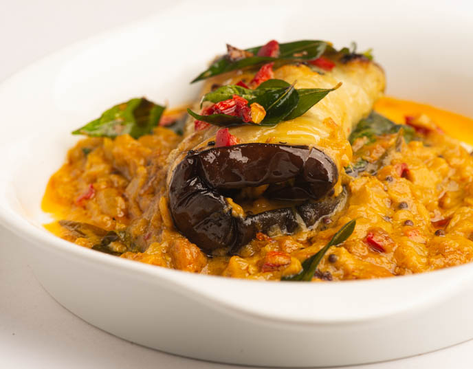 Need A Vegetarian Entree for Thanksgiving? This Stuffed Eggplant in Curry and Coconut Dal would be perfect!